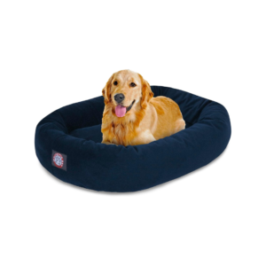 A dog on a Majestic Pet Dog Bed